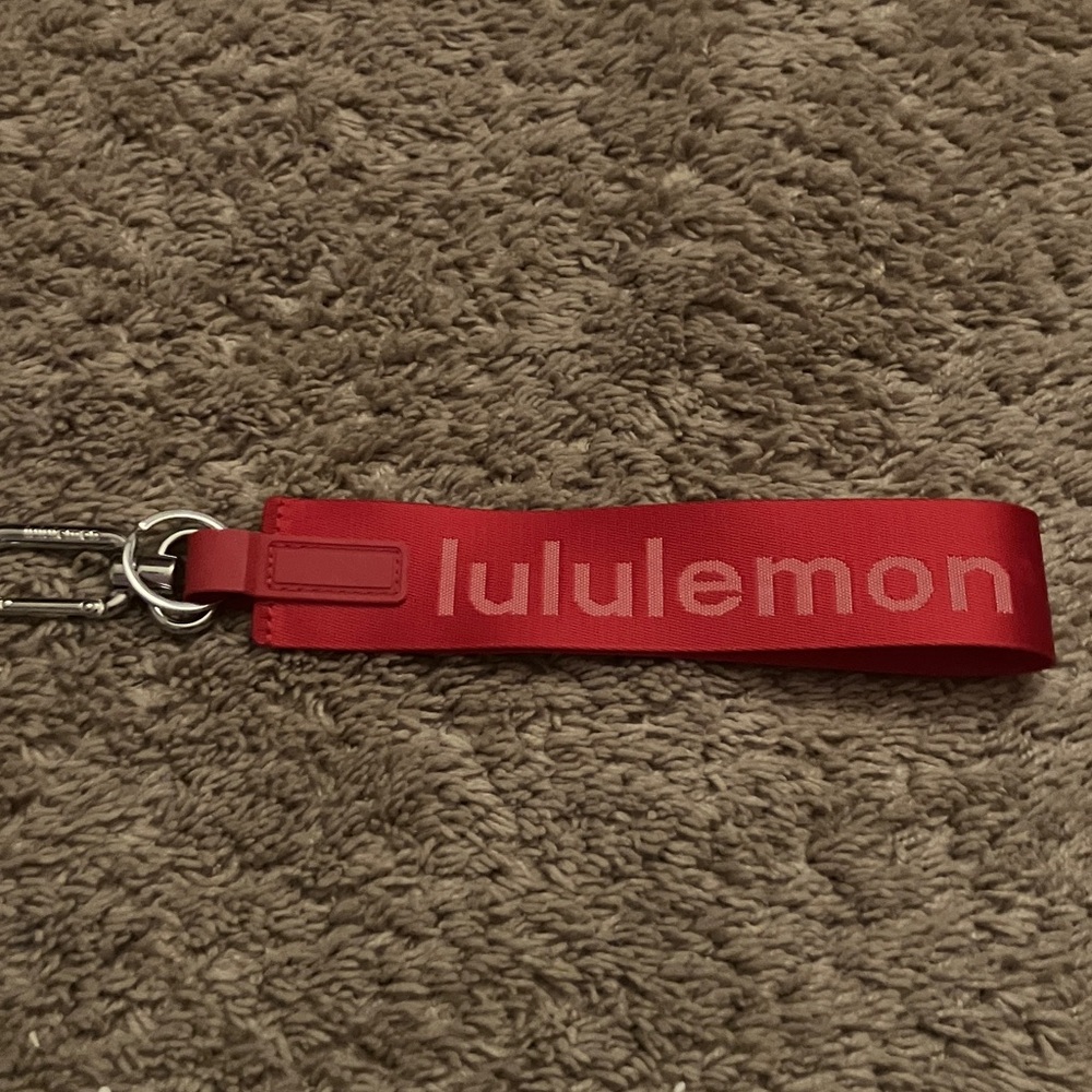 Nwt Lululemon red never lost wrist strap - Picture 2 of 2